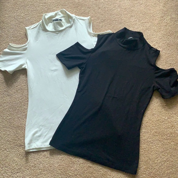 White and black turtlenecks w/ shoulder cut outs - Picture 1 of 3